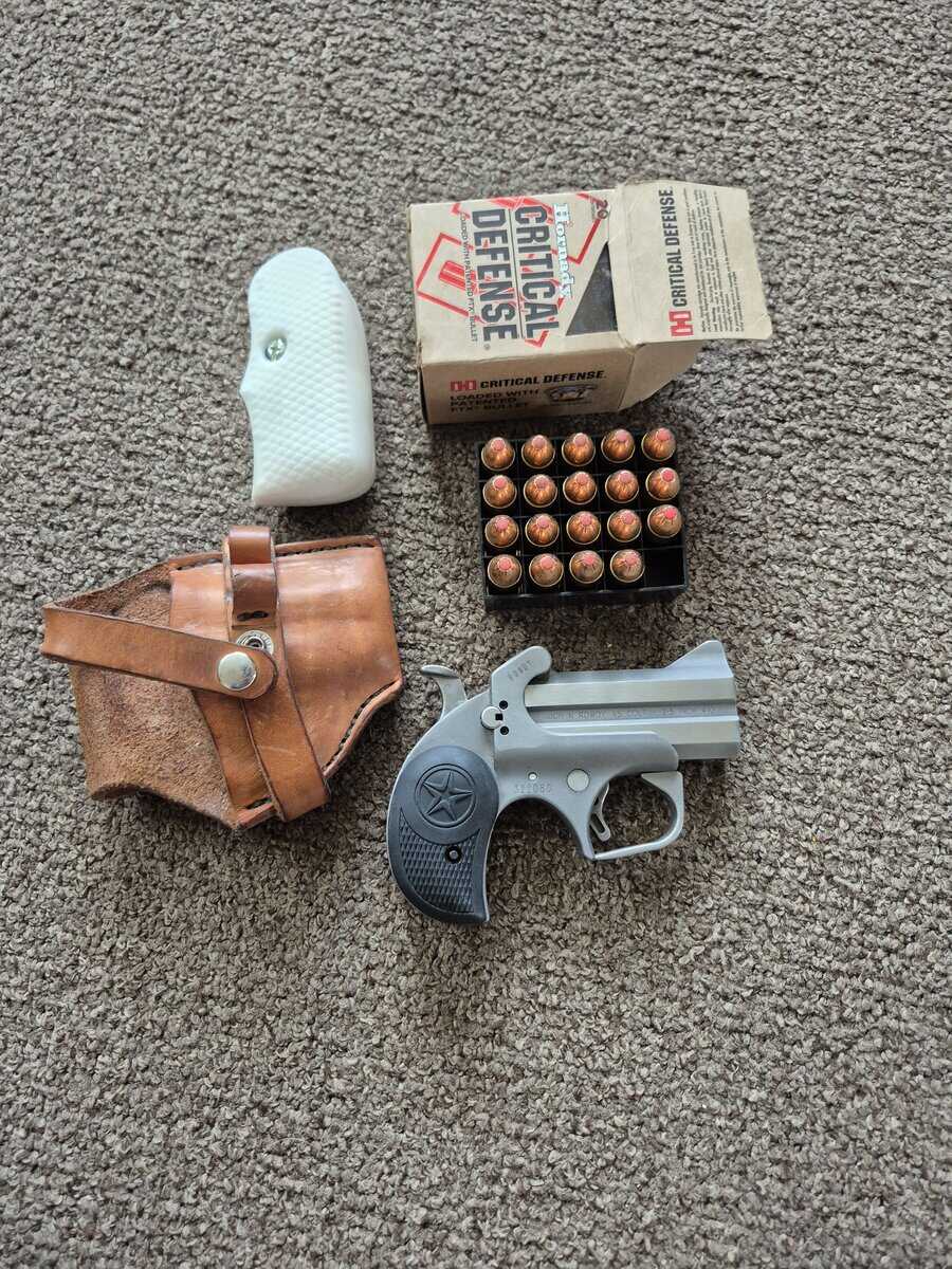 Bond arms 45 colt 2.5 410 with oversized handles holster and almost full box of ammo 250