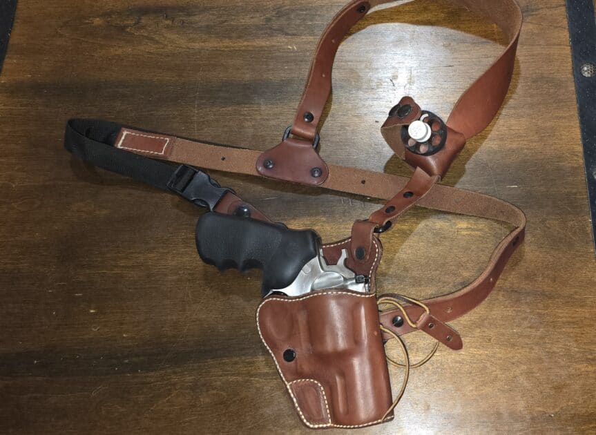 Ruger 44 magnum super redhawk + chest holster + speed loader in near new condition, less than 200 rounds fired