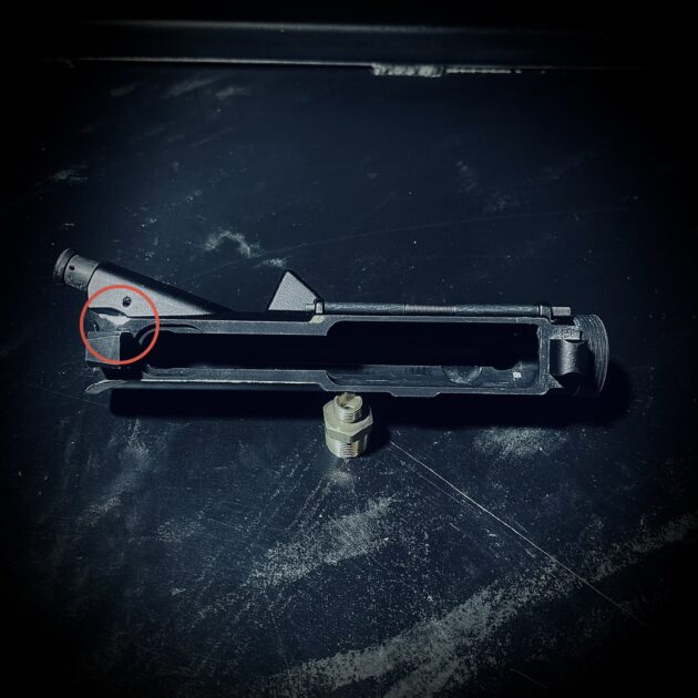 Blemishes and tan paint visible